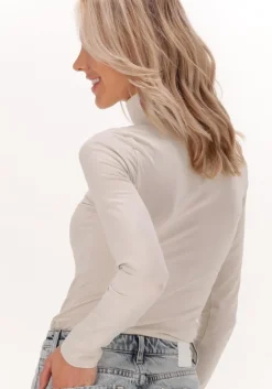 beige calvin klein top stacked logo ls roll neck