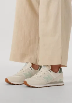 beige new balance lage sneakers wl574