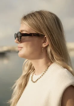 goudkleurig omoda atelier oorbellen earrings x iris