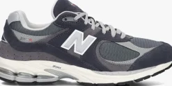 NEW BALANCE grijze lage sneakers m2002r m>DAMES Sneakers